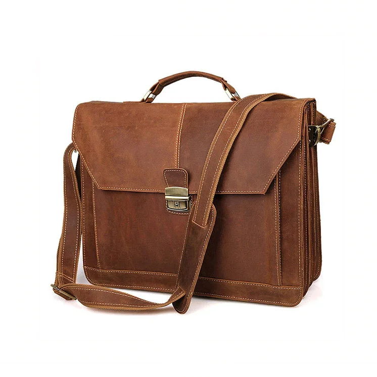 Canvas laptop bag with a detachable shoulder strap for versatilityThe Commodore Laptop Briefcase Canvas laptop bag with a detachable shoulder strap for versatilityThe Commodore Laptop Briefcase