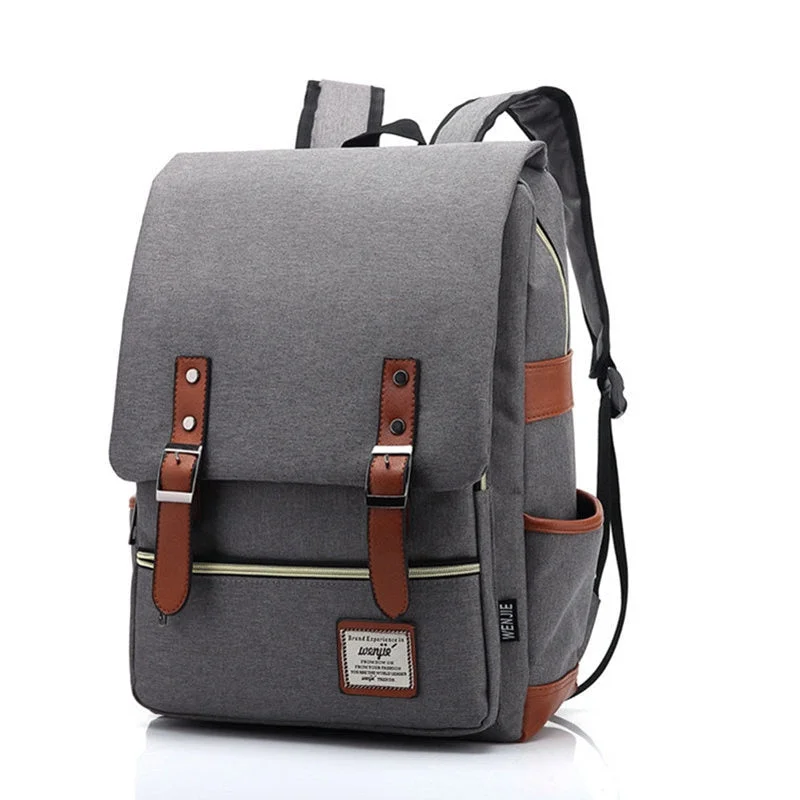 Vintage-style canvas laptop bag with brass hardware for a classic lookThe Scholar Laptop Backpack Vintage-style canvas laptop bag with brass hardware for a classic lookThe Scholar Laptop Backpack