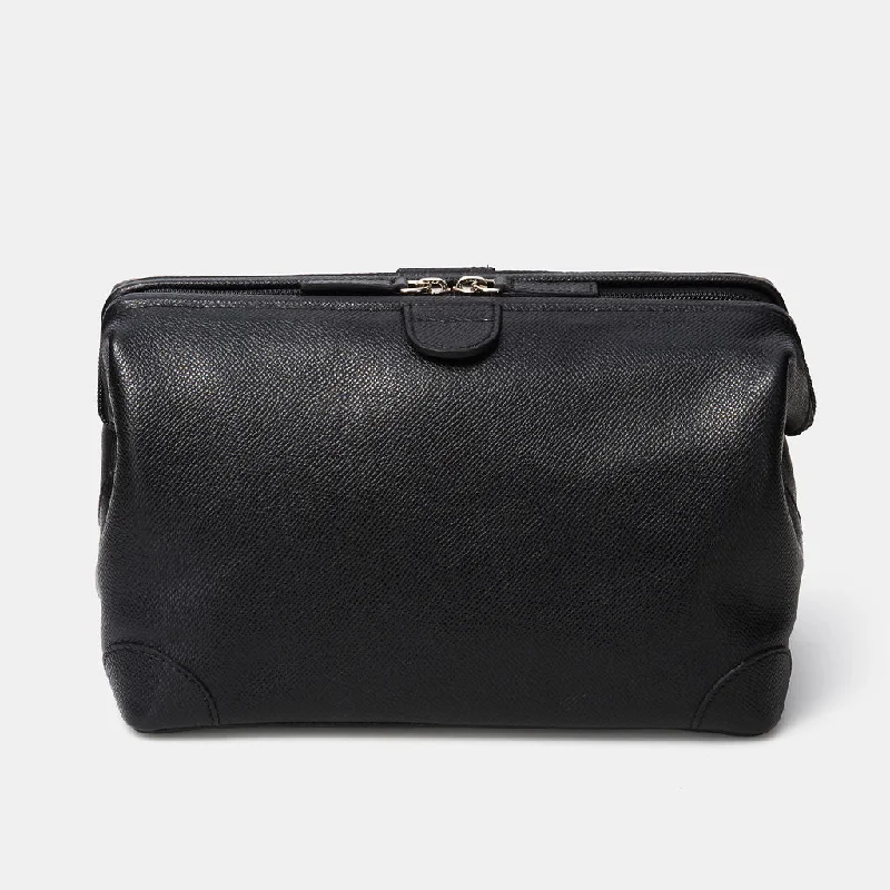 Travel bag with a retractable garment rack for easy unpackingLEATHER SHAVING CASE