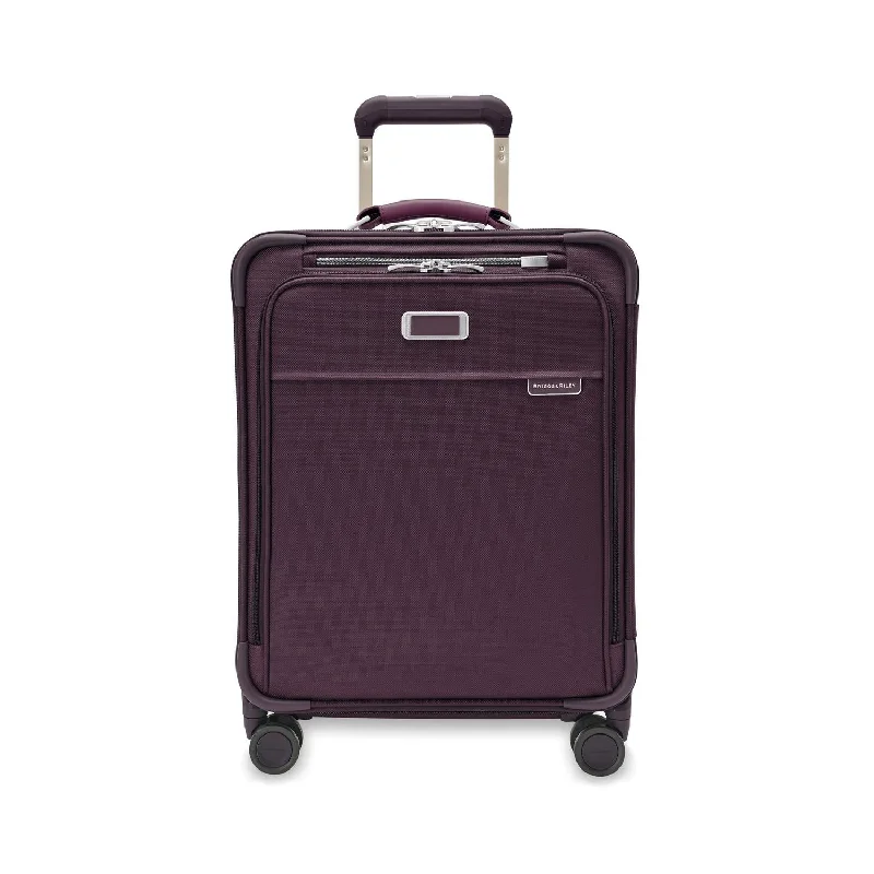 Designer - branded leather travel bag for luxury business travelersBriggs & Riley Baseline Limited Edition Global 21" Carry-On Expandable Spinner - Plum Designer - branded leather travel bag for luxury business travelersBriggs & Riley Baseline Limited Edition Global 21" Carry-On Expandable Spinner - Plum
