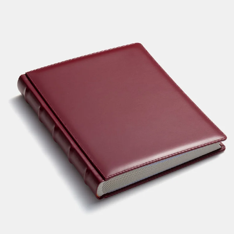 Travel bag with a built - in power bank charger for on - the - go device chargingLARGE BOUND PHOTO ALBUM Travel bag with a built - in power bank charger for on - the - go device chargingLARGE BOUND PHOTO ALBUM