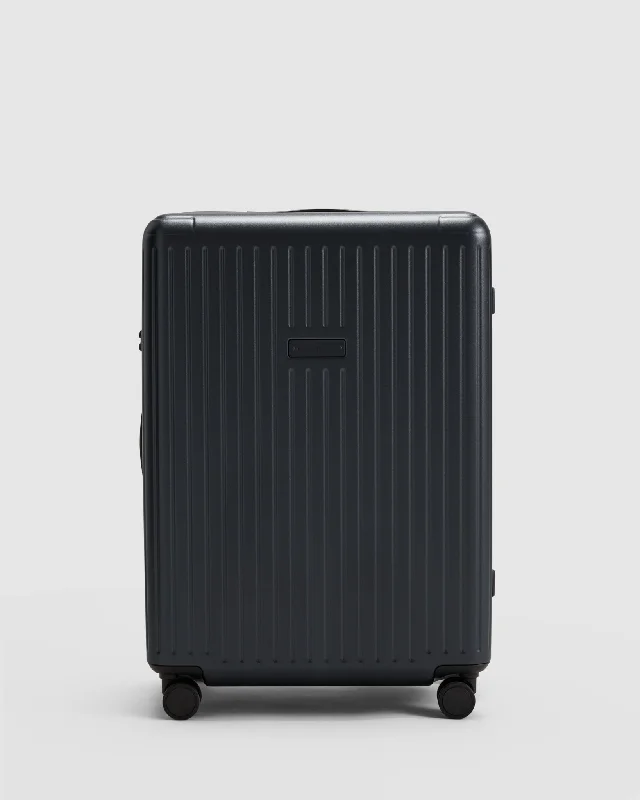 Convertible travel bag that can be used as a backpack or toteMedium Check In Suitcase - Caviar Black Convertible travel bag that can be used as a backpack or toteMedium Check In Suitcase - Caviar Black