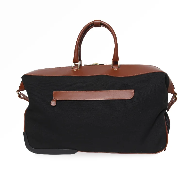 Compact carry - on travel bag with spinner wheels for easy maneuvering in airportsCARRY-ON WHEELED DUFFLE Compact carry - on travel bag with spinner wheels for easy maneuvering in airportsCARRY-ON WHEELED DUFFLE