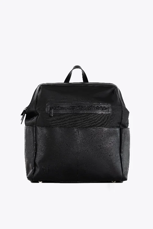 Compact carry - on travel bag with spinner wheels for easy maneuvering in airportsThe Backpack Diaper Bag in Black Compact carry - on travel bag with spinner wheels for easy maneuvering in airportsThe Backpack Diaper Bag in Black