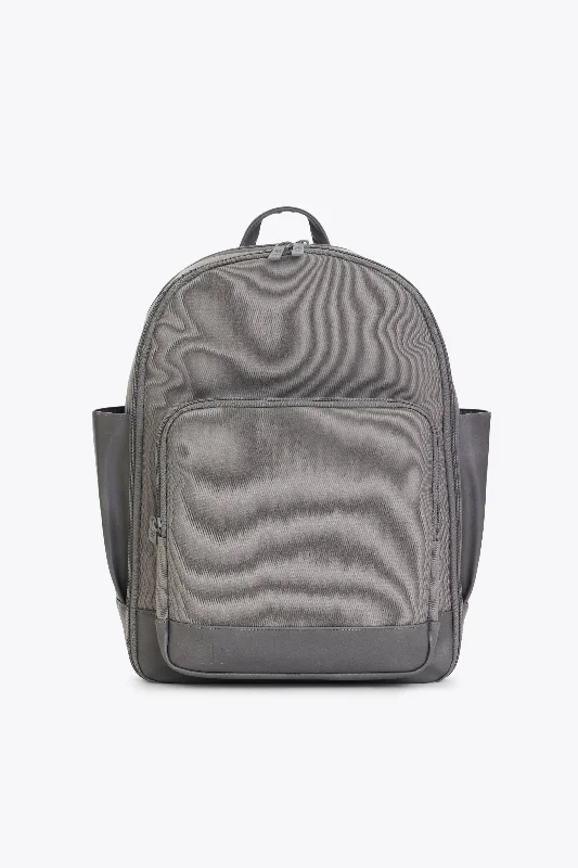 Soft - sided travel bag with reinforced corners for durabilityThe Backpack in Grey