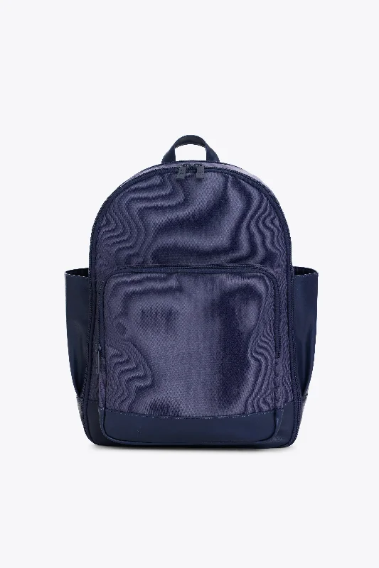 Expandable hard - shell polycarbonate travel bag for long - term international tripsThe Backpack in Navy Expandable hard - shell polycarbonate travel bag for long - term international tripsThe Backpack in Navy