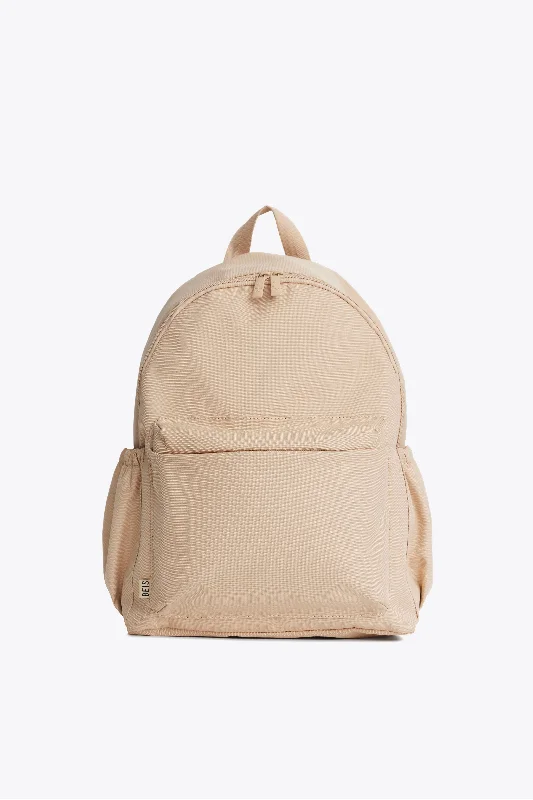 Foldable fabric travel bag for convenient storage when not in useThe BÉISics Backpack in Beige Foldable fabric travel bag for convenient storage when not in useThe BÉISics Backpack in Beige
