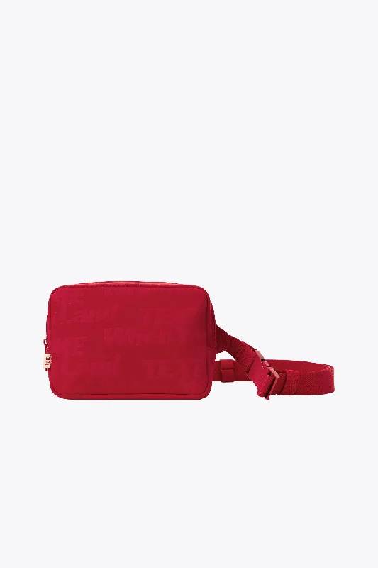 Vintage leather travel bag with brass accents for a classic and sophisticated lookThe Belt Bag in Text Me Red Vintage leather travel bag with brass accents for a classic and sophisticated lookThe Belt Bag in Text Me Red
