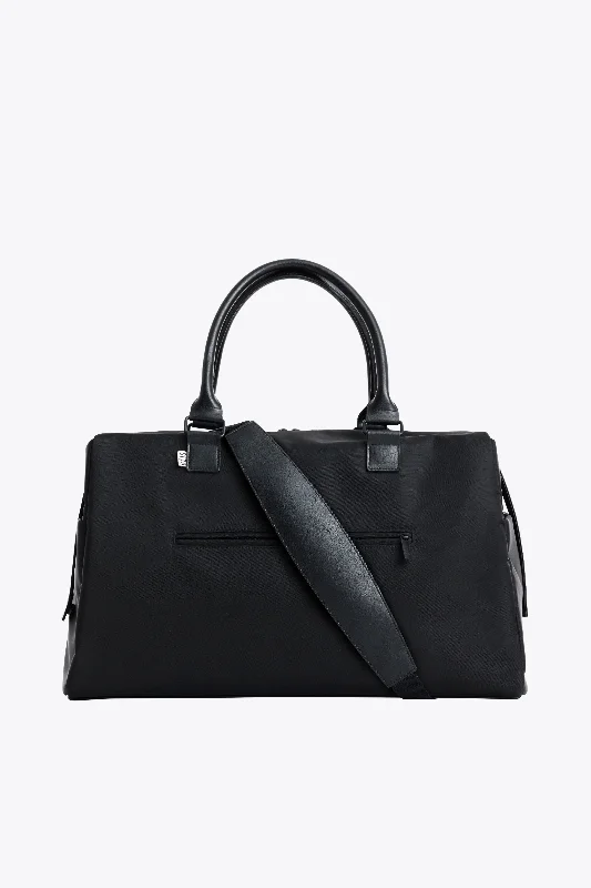 Smart travel bag with integrated GPS tracker for lost item recoveryThe Commuter Duffle in Black Smart travel bag with integrated GPS tracker for lost item recoveryThe Commuter Duffle in Black