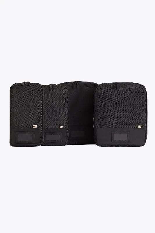 Travel bag with a retractable garment rack for easy unpackingThe Compression Packing Cubes 4 pc in Black Travel bag with a retractable garment rack for easy unpackingThe Compression Packing Cubes 4 pc in Black