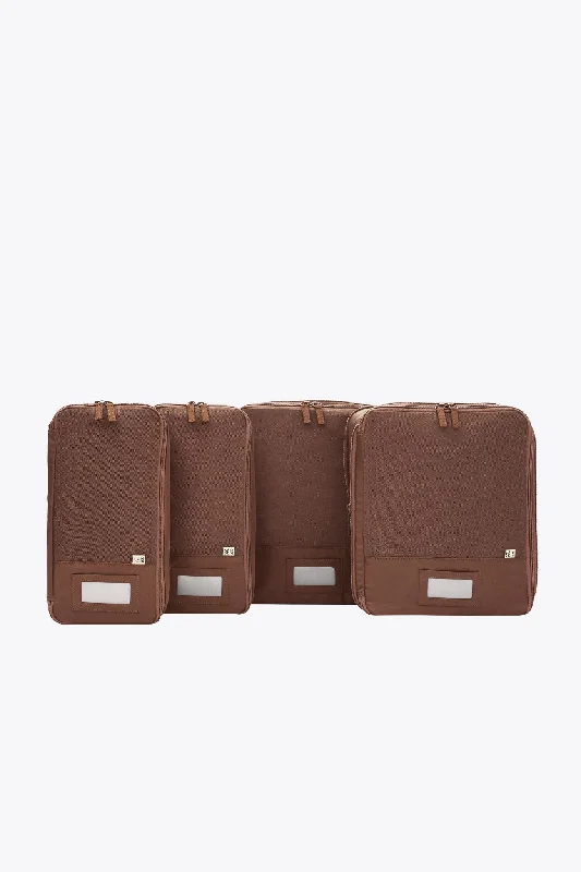 Travel bag with a built - in power bank charger for on - the - go device chargingThe Compression Packing Cubes 4 pc in Maple Travel bag with a built - in power bank charger for on - the - go device chargingThe Compression Packing Cubes 4 pc in Maple