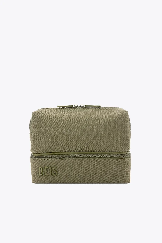 Soft - sided travel bag with reinforced corners for durabilityThe Cosmetic Organizer in Olive