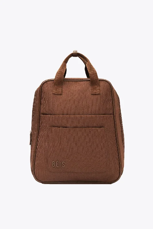 Vintage leather travel bag with brass accents for a classic and sophisticated lookThe Expandable Backpack in Maple Vintage leather travel bag with brass accents for a classic and sophisticated lookThe Expandable Backpack in Maple
