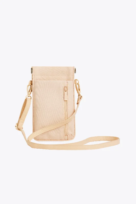 Anti - theft travel bag with RFID - blocking pockets for personal safetyThe ID Crossbody Bag In Beige Anti - theft travel bag with RFID - blocking pockets for personal safetyThe ID Crossbody Bag In Beige