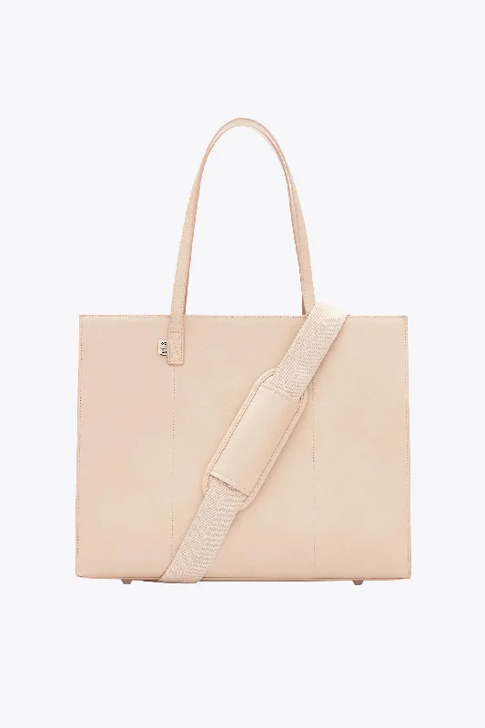 Travel bag with a retractable garment rack for easy unpackingThe Large Work Tote in Beige Travel bag with a retractable garment rack for easy unpackingThe Large Work Tote in Beige