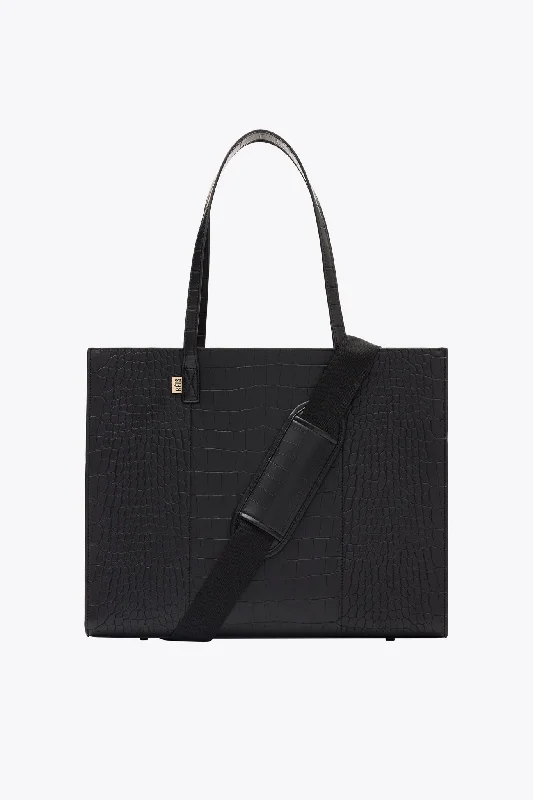 Travel bag with a detachable toiletry pouch for convenienceThe Large Work Tote in Black Croc Travel bag with a detachable toiletry pouch for convenienceThe Large Work Tote in Black Croc