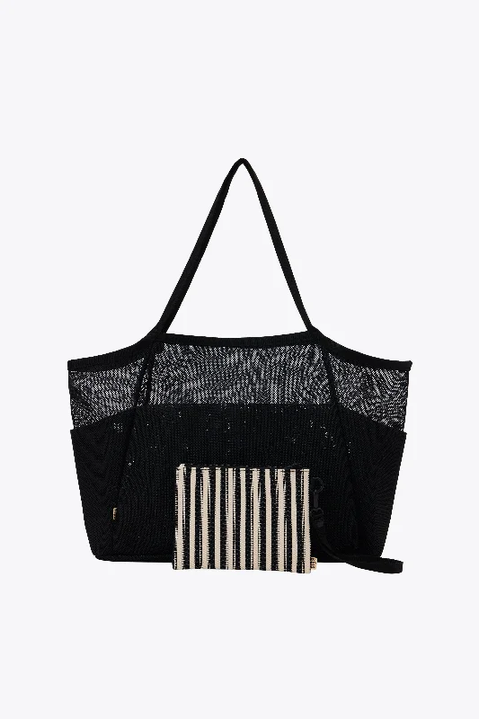 Convertible travel bag that can be used as a backpack or toteThe Mesh Beach Tote in Black Convertible travel bag that can be used as a backpack or toteThe Mesh Beach Tote in Black