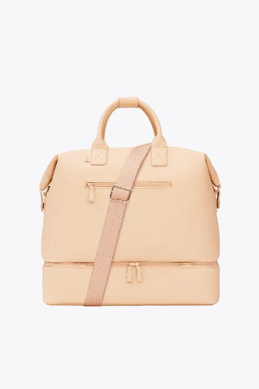 Travel bag with a detachable toiletry pouch for convenienceThe Premium Weekender in Beige Travel bag with a detachable toiletry pouch for convenienceThe Premium Weekender in Beige