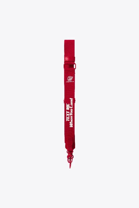 Designer - branded leather travel bag for luxury business travelersThe Shoulder Strap in Text Me Red Designer - branded leather travel bag for luxury business travelersThe Shoulder Strap in Text Me Red