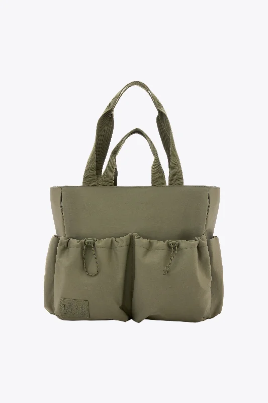 Stackable travel bag set with various sizes for diverse packing needsThe Sport Carryall in Olive Stackable travel bag set with various sizes for diverse packing needsThe Sport Carryall in Olive