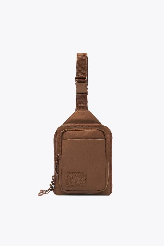 Hiking - specific travel bag with hydration bladder compatibilityThe Sport Sling in Maple Hiking - specific travel bag with hydration bladder compatibilityThe Sport Sling in Maple