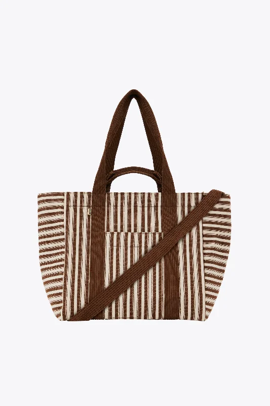 Travel bag with a detachable toiletry pouch for convenienceThe Vacation Tote in Maple Stripe Travel bag with a detachable toiletry pouch for convenienceThe Vacation Tote in Maple Stripe