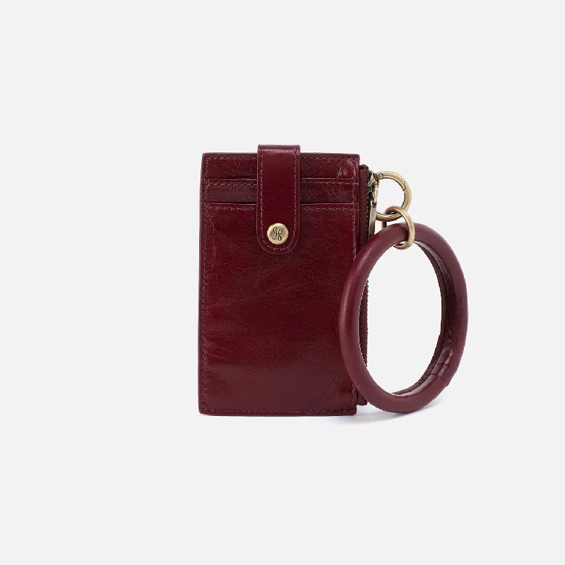 Vintage-style money clips for collectorsRing Credit Card Wristlet In Polished Leather - Winterberry Vintage-style money clips for collectorsRing Credit Card Wristlet In Polished Leather - Winterberry