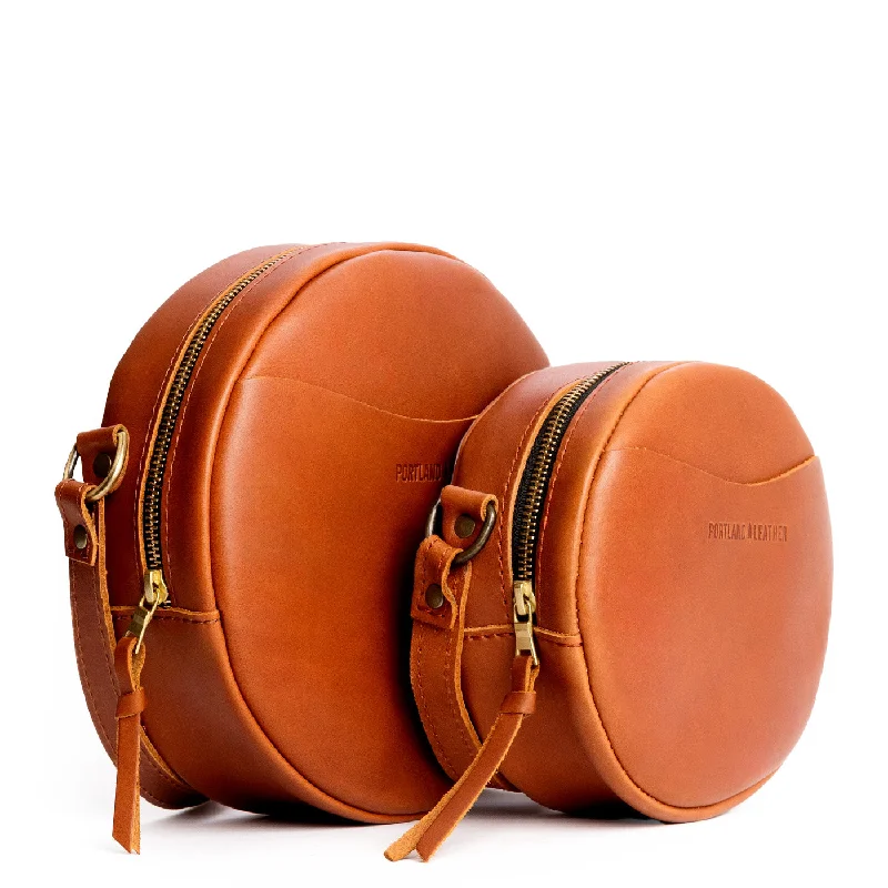 Cowhide leather coin and key purses with a rustic lookCircle Crossbody