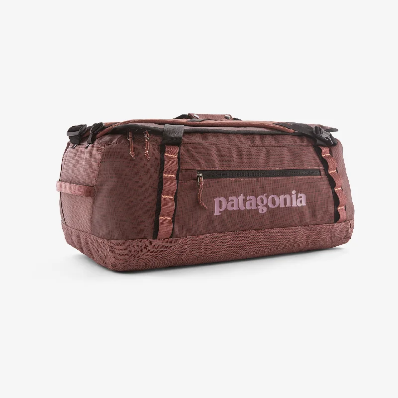 Vintage leather travel bag with brass accents for a classic and sophisticated lookBlack Hole® Duffel 55L Vintage leather travel bag with brass accents for a classic and sophisticated lookBlack Hole® Duffel 55L