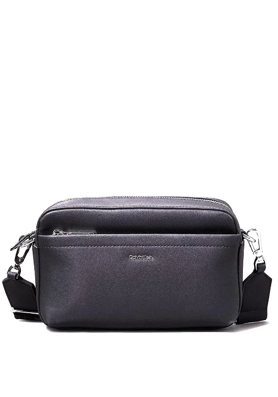 Military - style men's crossbody bag with MOLLE webbing for attachmentsCalvin Klein Logo Crossbody Camera Bag, Black Military - style men's crossbody bag with MOLLE webbing for attachmentsCalvin Klein Logo Crossbody Camera Bag, Black