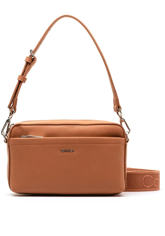 Men's crossbody bag made from recycled materials for eco - friendly usersCalvin Klein Convertible Crossbody Camera Bag, Beige Men's crossbody bag made from recycled materials for eco - friendly usersCalvin Klein Convertible Crossbody Camera Bag, Beige
