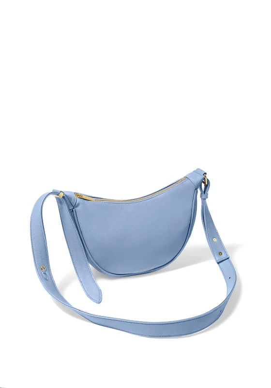 Canvas men's crossbody bag with a rustic, casual styleKatie Loxton Harley Sling Saddle Bag, Cornflower Blue Canvas men's crossbody bag with a rustic, casual styleKatie Loxton Harley Sling Saddle Bag, Cornflower Blue
