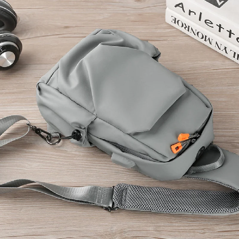 Men's travel backpack with multiple external pockets for easy accessMen's Chest Men's Shoulder Bag Solid Color Messenger