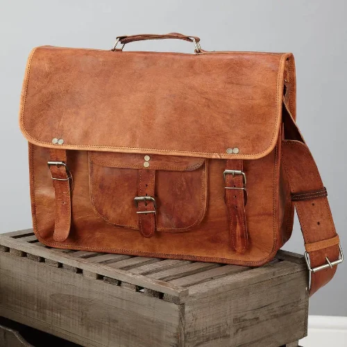 Vintage leather travel bag with brass accents for a classic and sophisticated lookLarge Men's Classic Leather Satchel Vintage leather travel bag with brass accents for a classic and sophisticated lookLarge Men's Classic Leather Satchel
