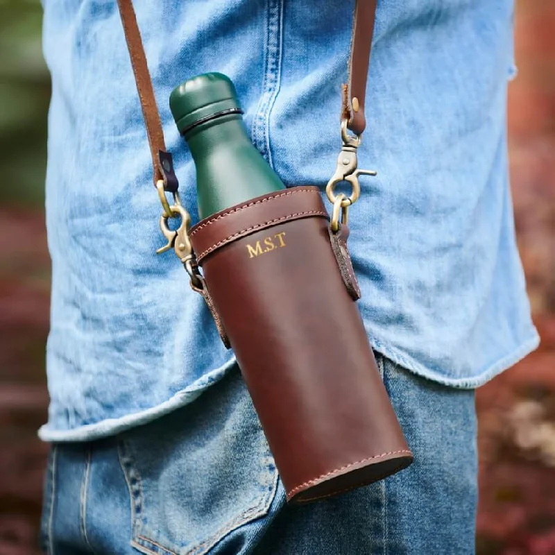 Rolling travel bag with adjustable telescopic handle for different user heightsPersonalised Leather Water Bottle Holder Rolling travel bag with adjustable telescopic handle for different user heightsPersonalised Leather Water Bottle Holder