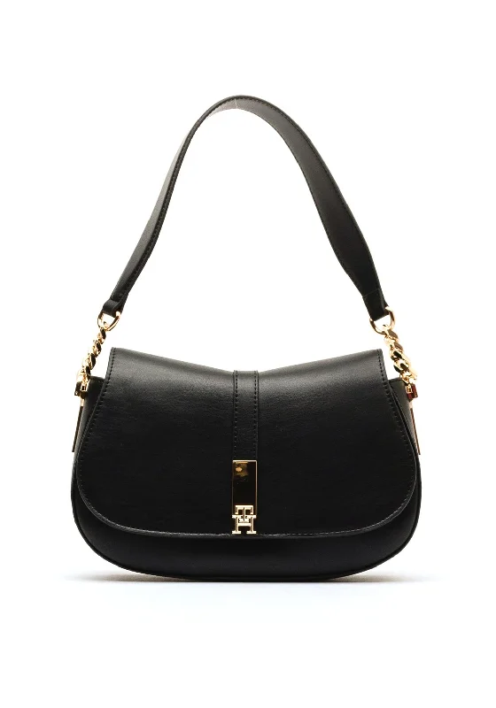 Designer men's crossbody bag with a unique pattern or logoTommy Hilfiger Heritage Crossbody Saddle Bag, Black Designer men's crossbody bag with a unique pattern or logoTommy Hilfiger Heritage Crossbody Saddle Bag, Black