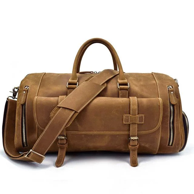 Travel bag with a retractable garment rack for easy unpackingThe Bard Weekender | Handmade Leather Duffle Bag Travel bag with a retractable garment rack for easy unpackingThe Bard Weekender | Handmade Leather Duffle Bag