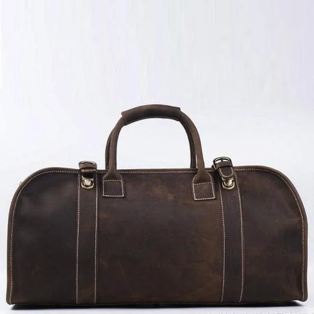 Travel bag with a retractable garment rack for easy unpackingThe Erlend Duffle Bag | Vintage Leather Weekender Travel bag with a retractable garment rack for easy unpackingThe Erlend Duffle Bag | Vintage Leather Weekender